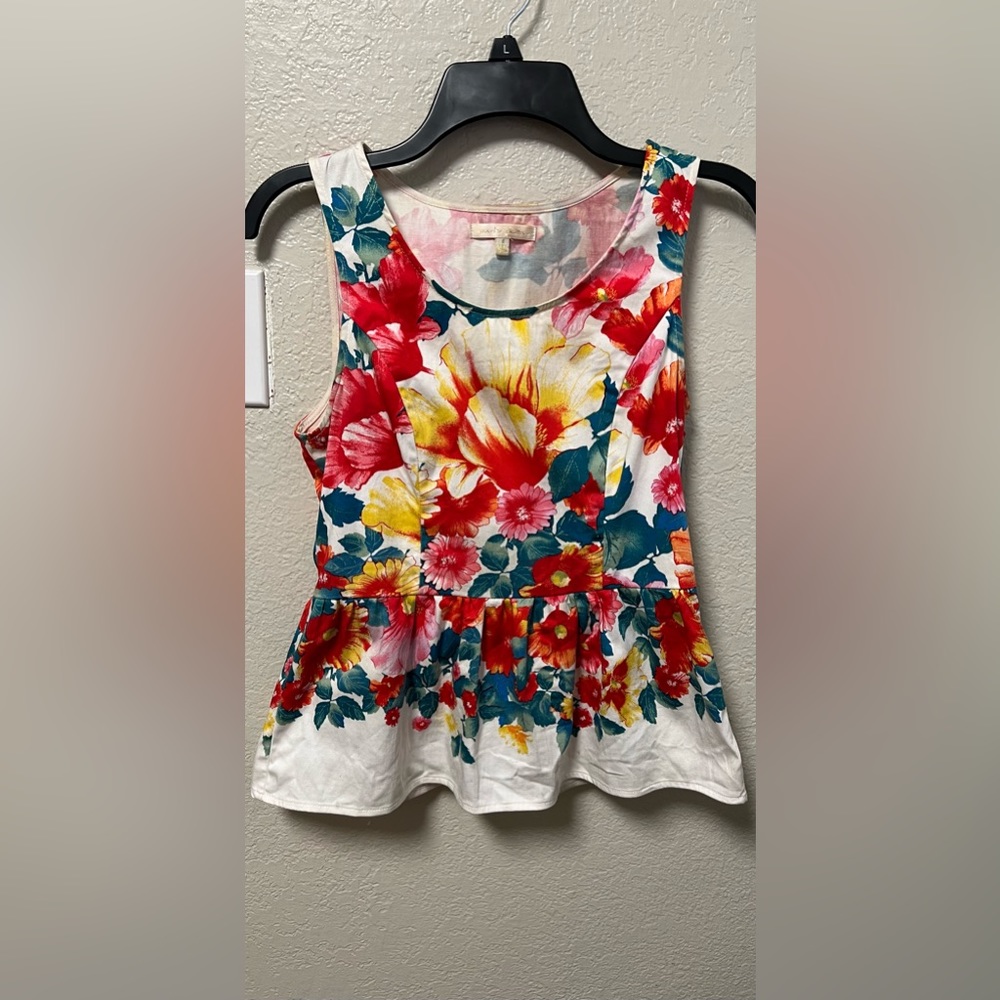 Women’s white and floral peplum top